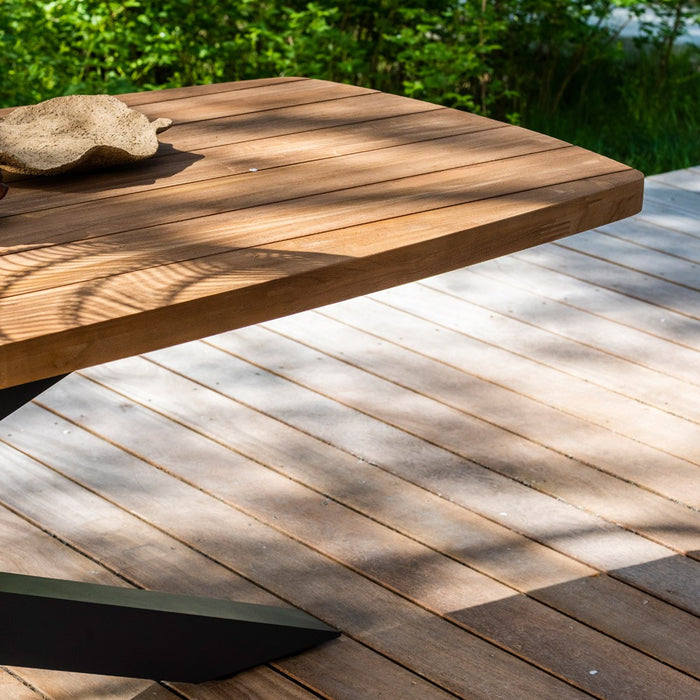 Outdoor dining table TIMOR (rounded) made of teak wood and anthracite aluminum